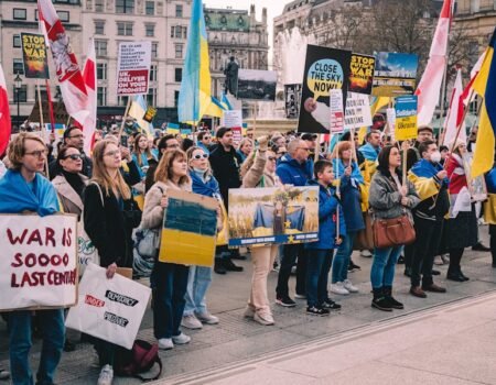 From Protest to Progress: The Role of Social Movements in Cryptocurrency Adoption